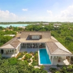 providenciales-oceanfront-home-chalk-sound drone view of backyard and pool