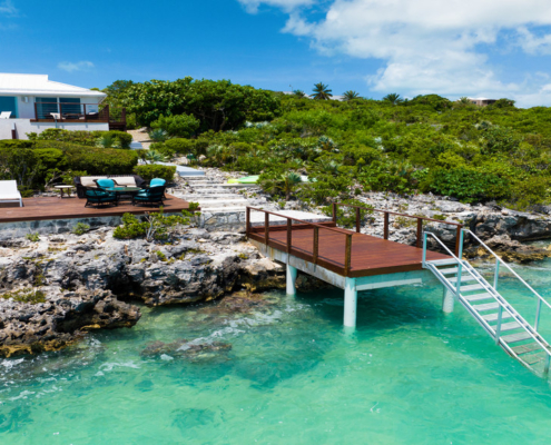 turks-caicos-waterfront-villa-alainn-chalk-sound drone exterior view dock and deck