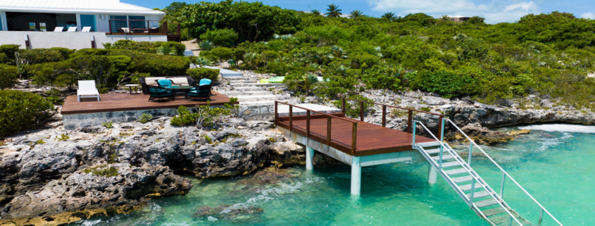 turks-caicos-waterfront-villa-alainn-chalk-sound drone exterior view dock and deck