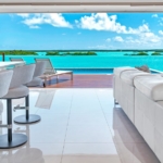 turks-caicos-waterfront-villa-alainn-chalk-sound view from kitchen bar to water