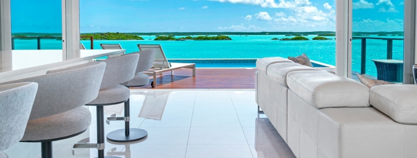 turks-caicos-waterfront-villa-alainn-chalk-sound view from kitchen bar to water