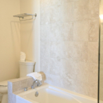 grace-bay-one bedroom-suite-3208-alexandra-resort-bathroom tub and shower