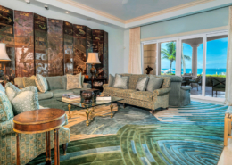 pinnacle-luxury-grace-bay-beachfront-condominium-suite105-real-living room view