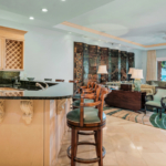 pinnacle-luxury-grace-bay-beachfront-condominium-suite105-kitchen view to living area