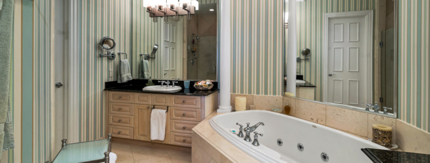 pinnacle-luxury-grace-bay-beachfront-condominium-suite105-primary en suite bathroom