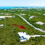 one-acre-long-bay-home-site- drone view with arrow showing location