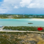turks-caicos-waterfront-turtle-tail-home-site drone view to ocean