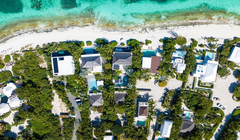 Luxury beachfront villas along Coconut Road, Turtle Tail including the Dunes Villa #1 and #2.