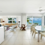 Le-Vele-suite-301-grace-bay-beachfront-condominium living area view to beach