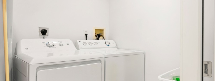 Le-Vele-suite-301-grace-bay-beachfront-condominium-laundry