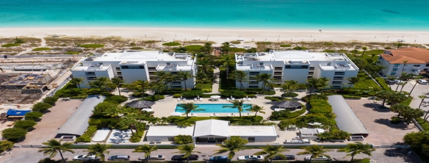 Le-Vele-suite-301-grace-bay-beachfront-condominium-drone view of resort and beach