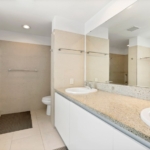 Le-Vele-suite-301-grace-bay-beachfront-condominium-primary en suite bathroom