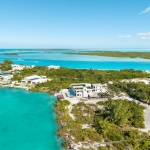 casa-verde-luxury-turks-caicos-canal-estate-drone view of canal, ocean and Emerald Point