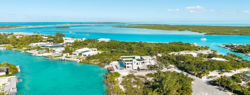 casa-verde-luxury-turks-caicos-canal-estate-drone view of canal, ocean and Emerald Point