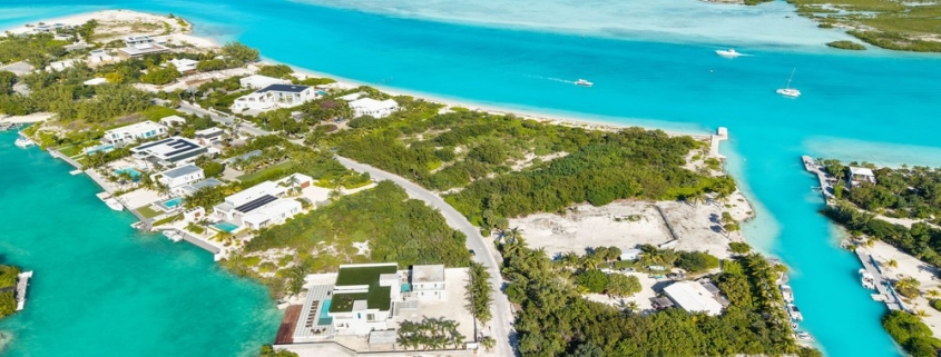 casa-verde-luxury-turks-caicos-canal-estate-drone view of canal, ocean and Emerald Point
