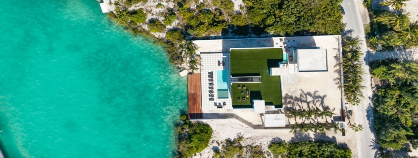 casa-verde-luxury-turks-caicos-canal-estate-drone view of property