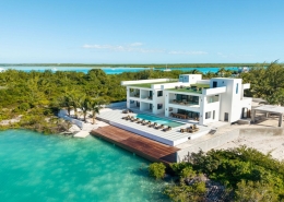 casa-verde-luxury-turks-caicos-canal-estate-drone view from canal