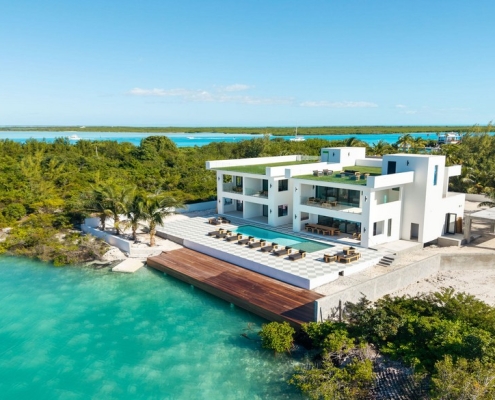casa-verde-luxury-turks-caicos-canal-estate-drone view from canal