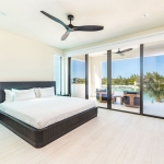 casa-verde-luxury-turks-caicos-canal-estate-lower level villa bedroom