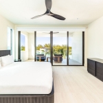 casa-verde-luxury-turks-caicos-canal-estate-lower level bedroom with pool view