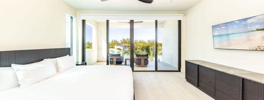 casa-verde-luxury-turks-caicos-canal-estate-lower level bedroom with pool view