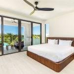 casa-verde-luxury-turks-caicos-canal-estate-lower level bedroom with pool view