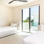 casa-verde-luxury-turks-caicos-canal-estate-villa bedroom with twin beds