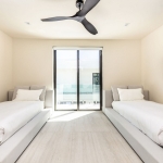 casa-verde-luxury-turks-caicos-canal-estate-villa bedroom with twin beds