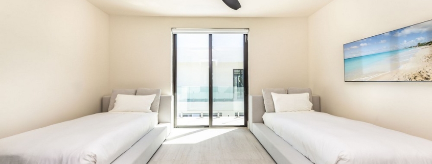 casa-verde-luxury-turks-caicos-canal-estate-villa bedroom with twin beds