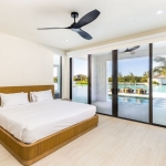 casa-verde-luxury-turks-caicos-canal-estate-bedroom with pool and canal view