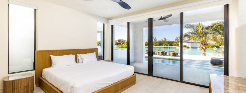 casa-verde-luxury-turks-caicos-canal-estate-bedroom with pool and canal view