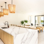 casa-verde-luxury-turks-caicos-canal-estate-main villa kitchen breakfast bar seating