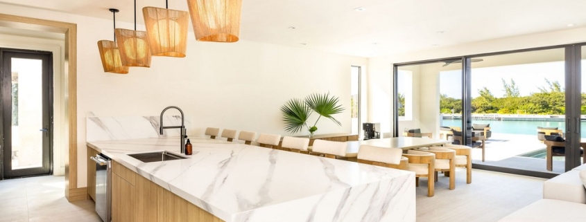 casa-verde-luxury-turks-caicos-canal-estate-main villa kitchen breakfast bar seating