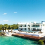 casa-verde-luxury-turks-caicos-canal-estate-drone view from canal