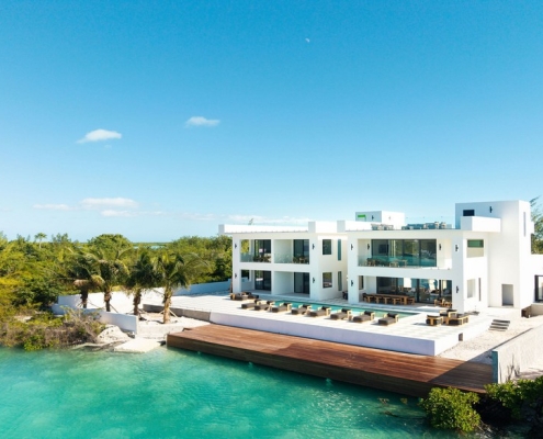 casa-verde-luxury-turks-caicos-canal-estate-drone view from canal