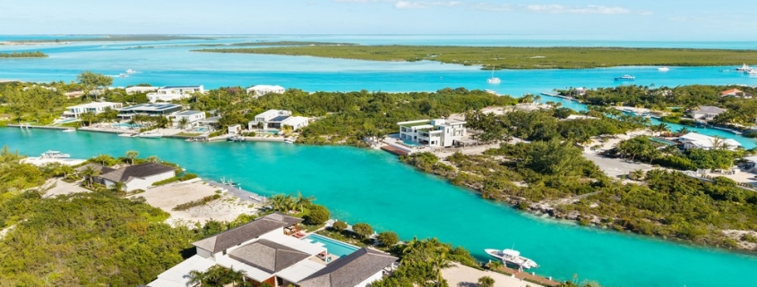 casa-verde-luxury-turks-caicos-canal-estate-drone view of canal, ocean and Emerald Point