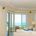 grace-bay-beachfront-1 bedroom-condo-suite 304-patio doors leading to balcony