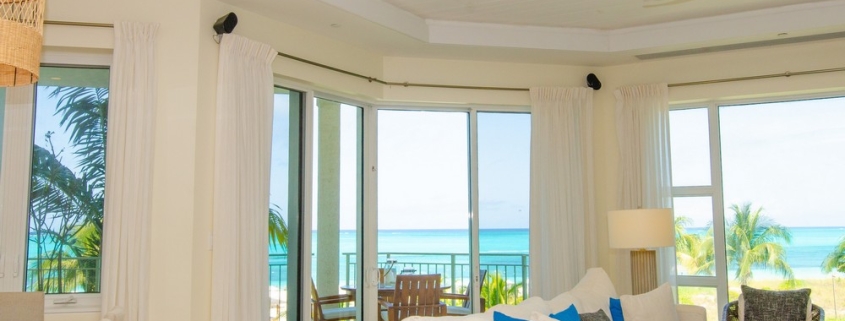 grace-bay-beachfront-1 bedroom-condo-suite 304-patio doors leading to balcony