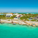 providenciales-oceanfront-villa-la-percha-chalk-sound-drone view of property and neighborhood