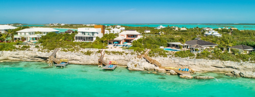 providenciales-oceanfront-villa-la-percha-chalk-sound-drone view of property and neighborhood