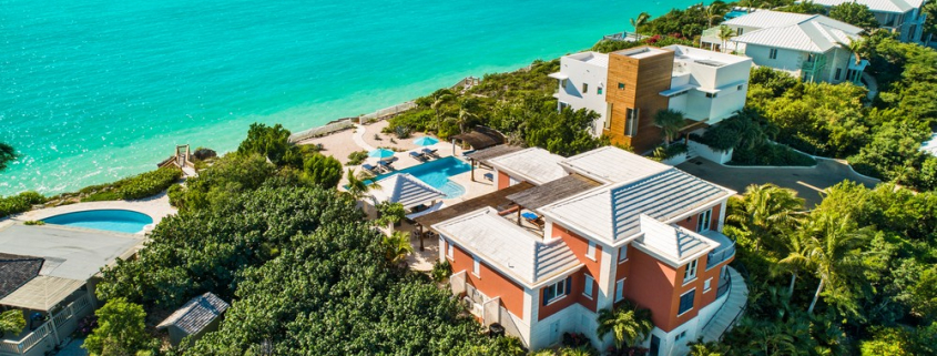 providenciales-oceanfront-villa-la-percha-chalk-sound-drone overhead view of property