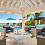 providenciales-oceanfront-villa-la-percha-chalk-sound-outdoor dining under roof