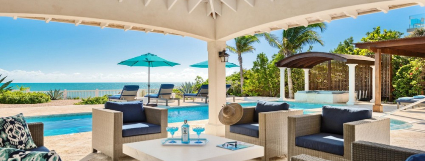 providenciales-oceanfront-villa-la-percha-chalk-sound-outdoor dining under roof