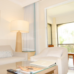 sands-at-grace-bay-studio-suite-6104-one-bedroom-view of living area to balcony