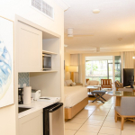 sands-at-grace-bay-studio-suite-6104-one-bedroom-entry and kitchenette