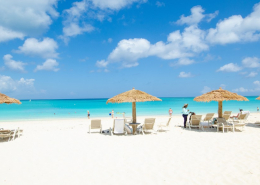 sands-at-grace-bay-beachfront resort lounge chairs in sand
