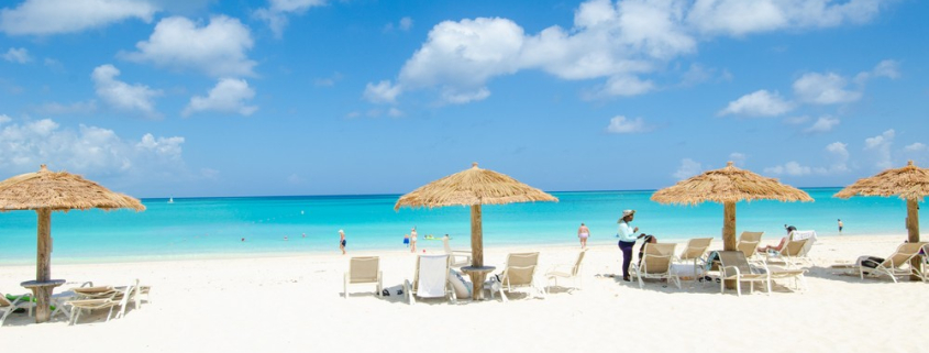 sands-at-grace-bay-beachfront resort lounge chairs in sand