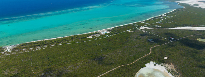 bambarra- beachfront-land-middle-caicos-real-estate-for-sale-3 bambarra-beachfront-land-middle-caicos-drone view of property