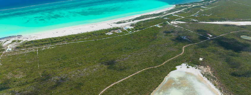 bambarra- beachfront-land-middle-caicos-real-estate-for-sale-4 bambarra-beachfront-land-middle-caicos-drone view of property