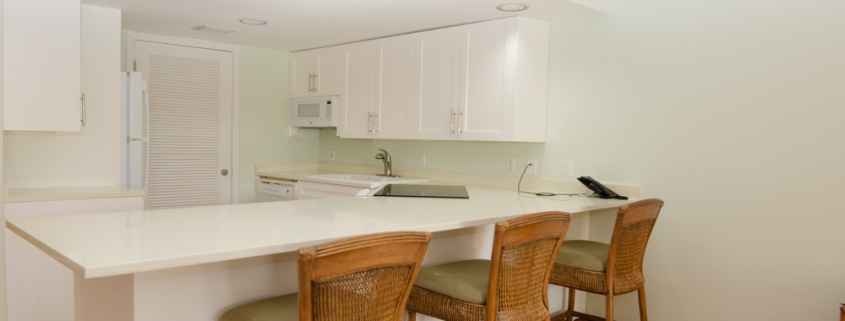 ocean-club-resort-junior-suite -grace-bay-beach-for-sale-5 ocean-club-resort-junior-suite-9107 kitchen with breakfast bar seating